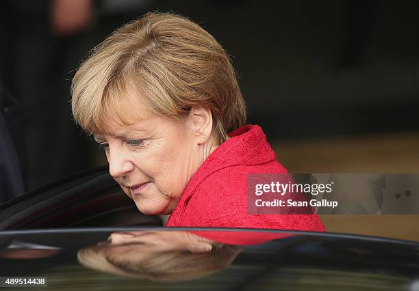 German Chancellor Angela Merkel departs after speaking at the presentation of former Chancellor Gerhard Schroeder's biography on September 22, 2015...