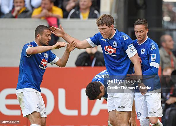 Ben Sahar, Stephan Salger, Fabian Klos and Christian Mueller of Bielefeld celebrate their teams first goal during the Second Bundesliga match between...