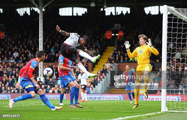 Hugo Rodallega of Fulham misses a header at goal during the Barclays Premier League match between Fulham and Crystal Palace at Craven Cottage on May...