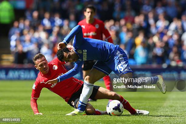 Craig Bellamy of Cardiff City challenges Mohamed Salah of Chelsea during the Barclays Premier League match between Cardiff City and Chelsea at...