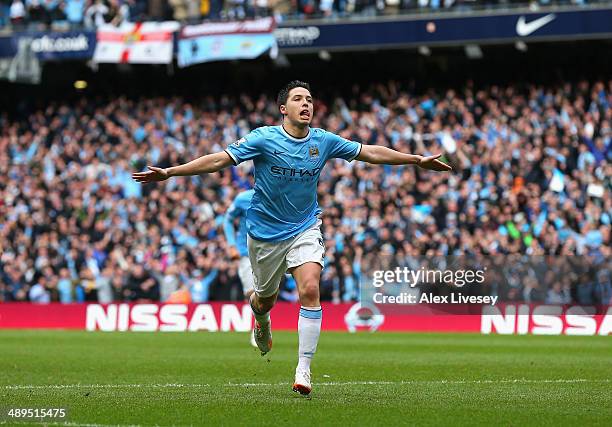 Samir Nasri of Manchester City celebrates scoring the first goal during the Barclays Premier League match between Manchester City and West Ham United...