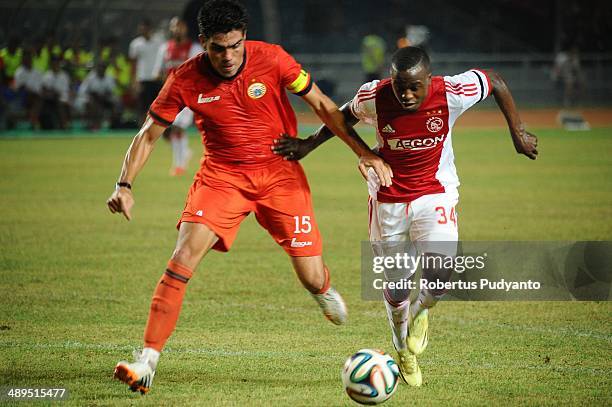 Lesly De Sa of AFC Ajax battle for the ball during the international friendly match between Perija Jakarta and AFC Ajax on May 11, 2014 in Jakarta,...