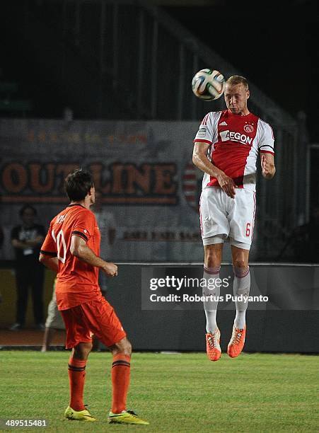 Mike Van Der Hoorn of AFC Ajax heading the ball during the international friendly match between Perija Jakarta and AFC Ajax on May 11, 2014 in...