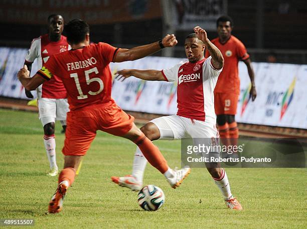 Lerin Duarte of AFC Ajax battle for the ball during the international friendly match between Perija Jakarta and AFC Ajax on May 11, 2014 in Jakarta,...
