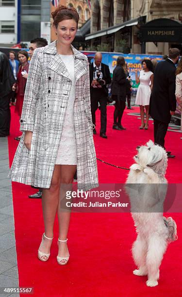 Ashleigh Butler and Pudsey attends the UK Premiere of "Postman Pat" at Odeon West End on May 11, 2014 in London, England.