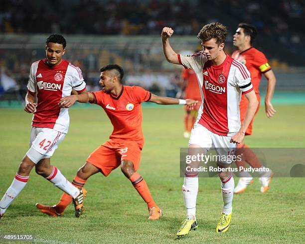 Lucas Andersen of AFC Ajax celebrates scoring their opening goal during the international friendly match between Perija Jakarta and AFC Ajax on May...