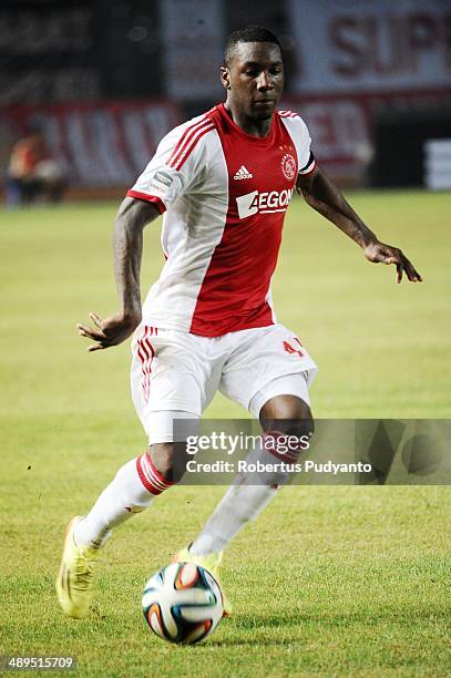 Sheraldo Becker of AFC Ajax runs with the ball during the international friendly match between Perija Jakarta and AFC Ajax on May 11, 2014 in...