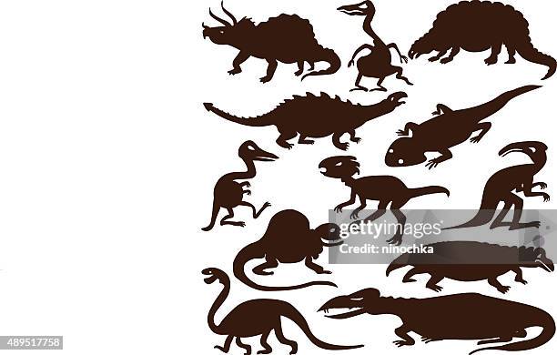 dinosaur silhouettes - flying lizard stock illustrations