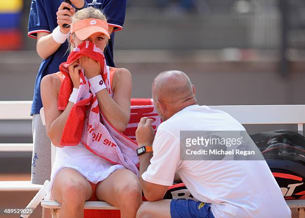 Urszula Radwanska of Poland in speaks to her coach during her match with Belinda Bencic of Switzerland during day one of the Internazionali BNL...