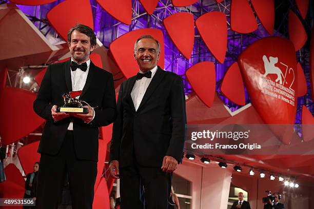 Lorenzo Vigas and Alberto Barbera attend the award winners photocall during the 72nd Venice Film Festival on September 12, 2015 in Venice, Italy.