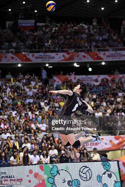 Yuki Ishikawa of Japan serves in the match between Japan and Poland during the FIVB Men's Volleyball World Cup Japan 2015 at Yoyogi National...