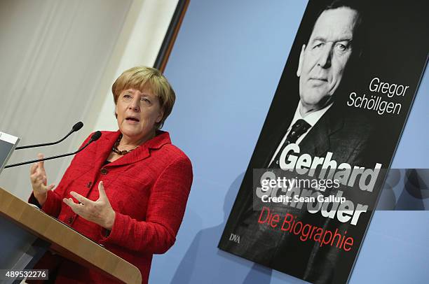 German Chancellor Angela Merkel speaks at the presentation of former Chancellor Gerhard Schroeder's biography on September 22, 2015 in Berlin,...