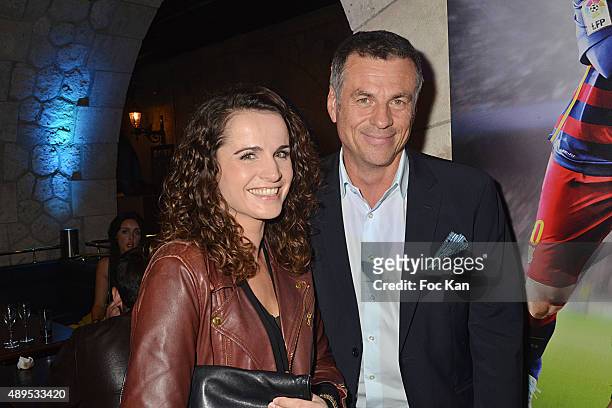 Anne-Laure Gruet and her companion Bruno Gaccio attend the 'FIFA 16 Live Event' at the Faust Club on September 21, 2015 in Paris, France.