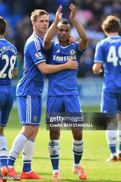 Chelsea's English defender Ashley Cole gestures to Chelsea fans following the English Premier League football match between Cardiff City and Chelsea...