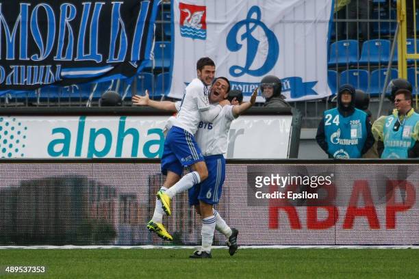 Leandro Fernandez of FC Dynamo Moscow and Aleksei Ionov of FC Dynamo Moscow celebrate a goal during the Russian Football League Championship match...