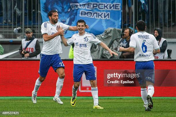 Artur Yusupov of FC Dynamo Moscow celebrates his goal with Kevin Kuranyi of FC Dynamo Moscow and Leandro Fernandez of FC Dynamo Moscow during the...
