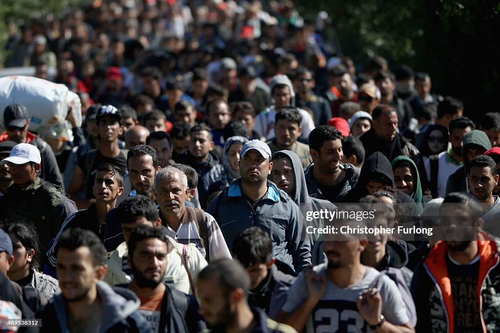 Migrants Cross From Hungary Into Austria On Route To Northern Europe