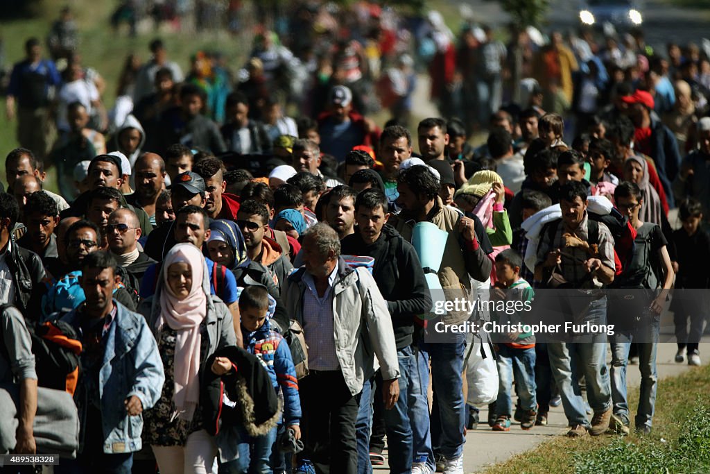 Migrants Cross From Hungary Into Austria On Route To Northern Europe