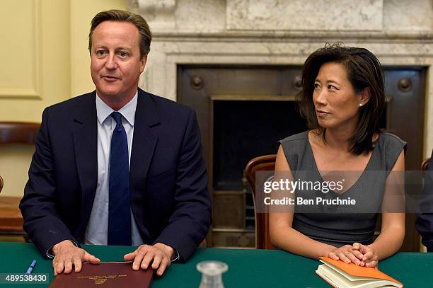 Prime Minister David Cameron talks with Eileen Burbidge during a Business Advisory Board meeting at Downing Street on September 22, 2015 in London,...