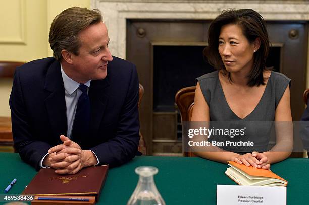 Prime Minister David Cameron talks with Eileen Burbidge during a Business Advisory Board meeting at Downing Street on September 22, 2015 in London,...