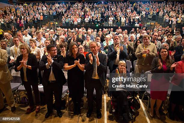 Liberal Democrats join Sarah Gurling as they applaud at the end of a special tribute to ex-leader Charles Kennedy on the fourth day of the Liberal...