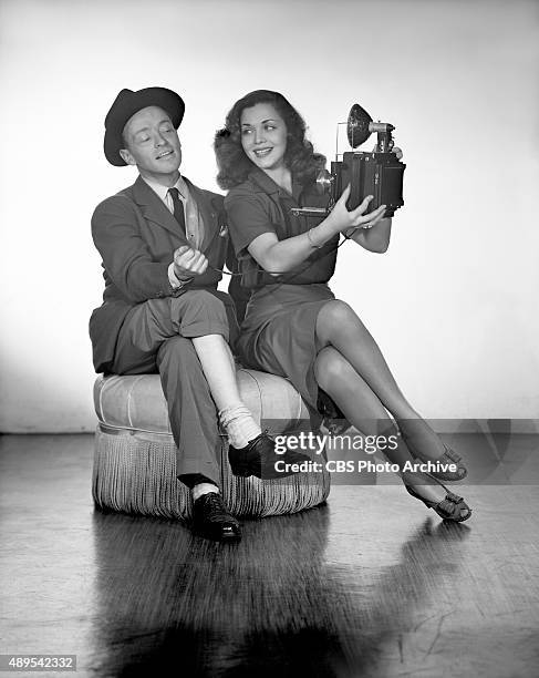 Singer and Broadway performer, Carol Bruce, with her press agent, poses for a "selfie" gag shot. Photo dated: February 1, 1944.