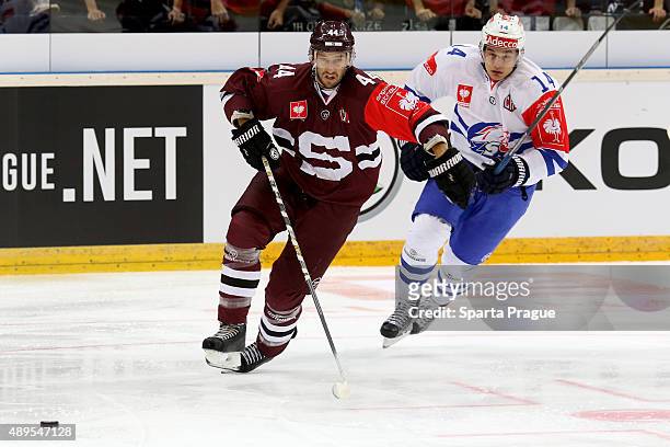 Ryan Glenn of HC Sparta Prague battling for the puck with Chris Baltisberger from ZSC Lions Zurich during the Champions Hockey League round of...