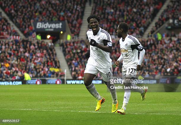 Wilried Bony and Nathan Dyer of Swansea City celebrates the third Swansea goal during the Barclays Premier League match between Sunderland and...