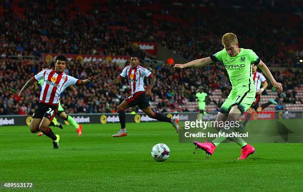 Kevin de Bruyne of Manchester City scores their second goal during the Capital One Cup third round match between Sunderland and Manchester City at...