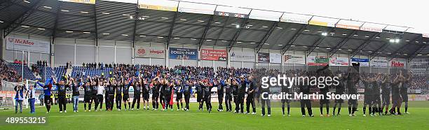 The Team of Paderborn celebrate promotion during the match between SC Paderborn and VFR Aalen at Benteler Arena on May 11, 2014 in Paderborn, Germany.