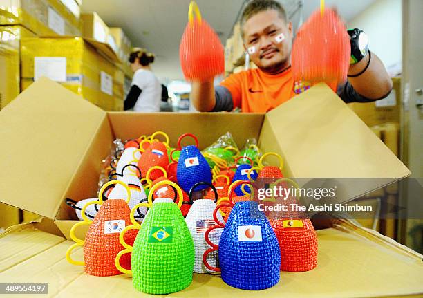 Colourful caxirola, official noisemakers of the next World Cup in Brazil, arrive in Japan on May 10, 2014 in Higashiosaka, Osaka, Japan. The first...