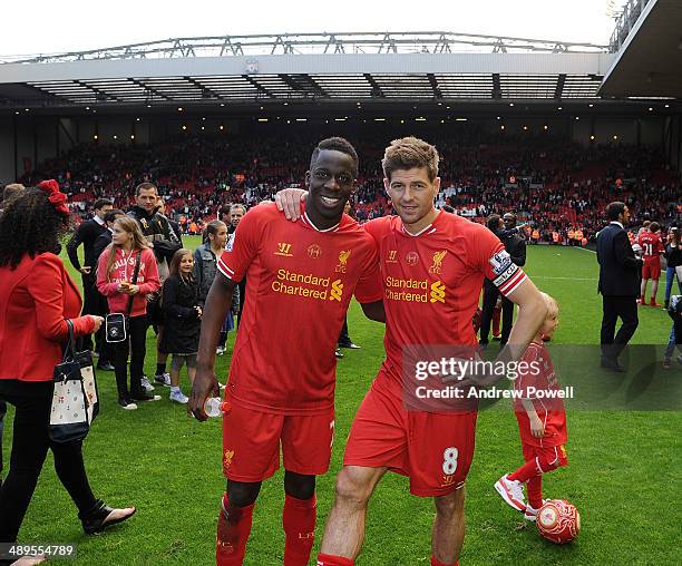 Steven Gerrard and Aly Cissokho of Liverpool at the end of the Barclays Premier League match between Liverpool and Newcastle United at Anfield on May...