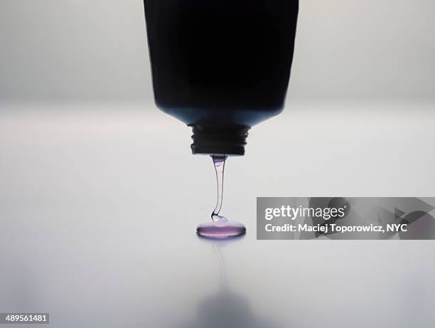 gel/liquid being squeezed from a plastic tube - creme tube ストックフォトと画像