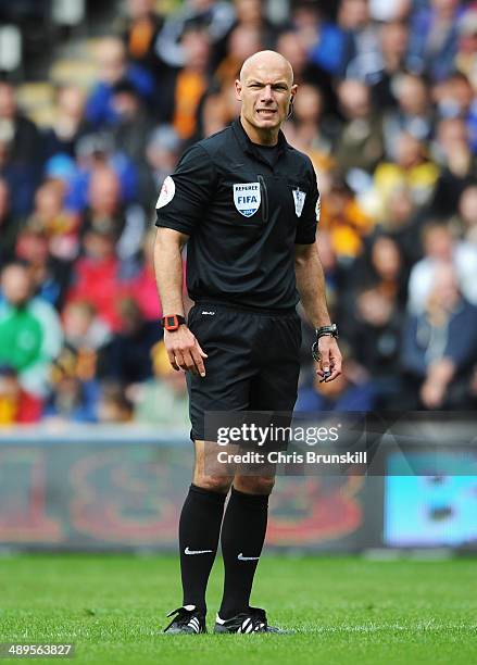 Referee Howard Webb looks on during the Barclays Premier League match between Hull City and Everton at KC Stadium on May 11, 2014 in Hull, England.