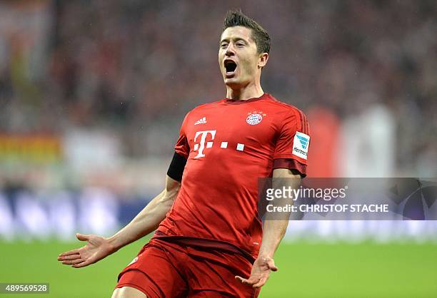 Bayern Munich's Polish striker Robert Lewandowski celebrates after the third goal for Munich during the German first division Bundesliga football...