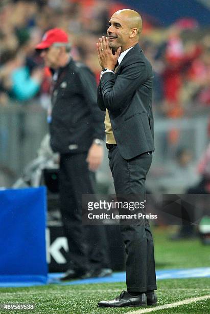 Josep Guardiola, head coach of FC Bayern Muenchen celebrates his team's fifth goal duirng the Bundesliga match between FC Bayern Muenchen and VfL...