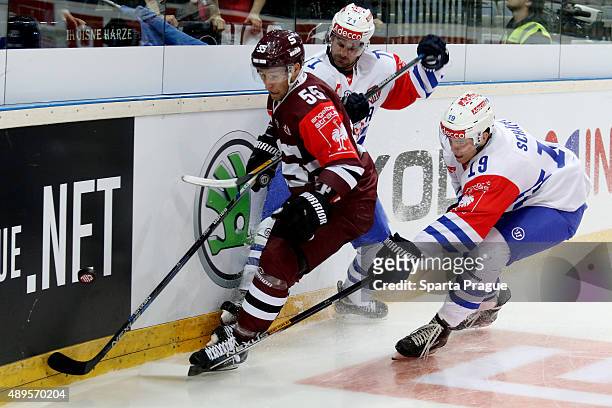 Robert Sabolic of the HC Sparta Prague battle for the puck with Patrik Bartschi and Reto Schappi from ZSC Lions Zurich during the Champions Hockey...