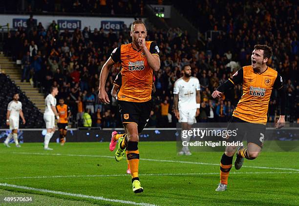 David Meyler of Hull City celebrates scoring the opening goal with Andrew Robertson of Hull City during the Capital One Cup third round match between...