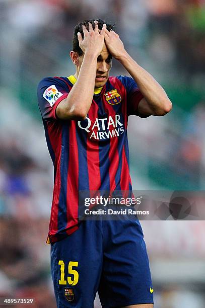 Marc Bartra of FC Barcelona reacts during the La Liga match between Elche FC and FC Barcelona at Estadio Manuel Martinez Valero on May 11, 2014 in...