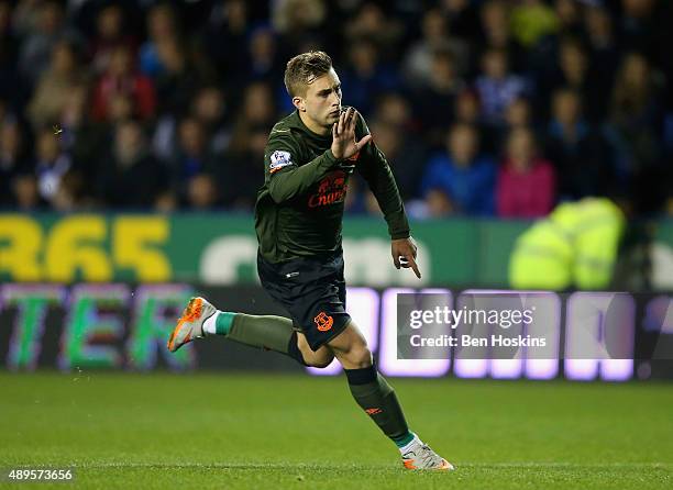 Gerard Deulofeu of Everton celebrates scoring the second goal during the Capital One Cup third round match between Reading and Everton at Madejski...