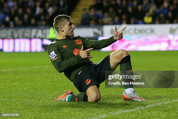 Gerard Deulofeu of Everton celebrates scoring the second goal during the Capital One Cup third round match between Reading and Everton at Madejski...