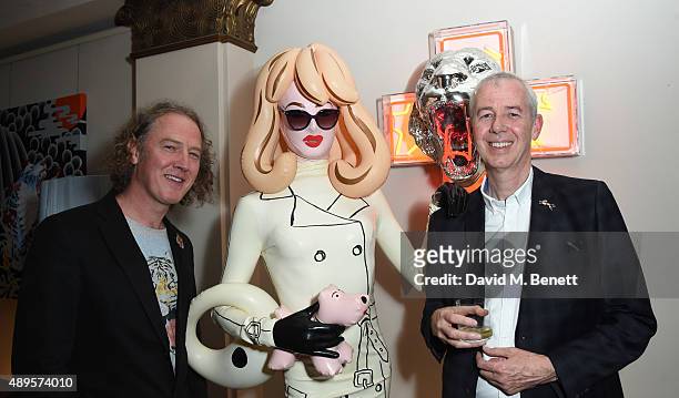 Christian Furr, Pandemonia and Simon Clinton attend The 'BE INSPIRED' art exhibition in aid of Save Wild Tigers, curated by Christian Furr at the...