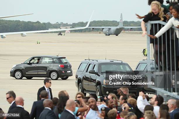 Pope Francis' Fiat rolls across the tarmac after he arrived from Cuba September 22, 2015 at Joint Base Andrews, Maryland. Francis will be visiting...