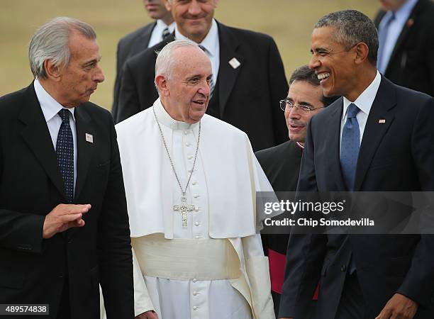 Pope Francis is escorted by U.S. President Barack Obama after arriving from Cuba September 22, 2015 at Joint Base Andrews, Maryland. Francis will be...