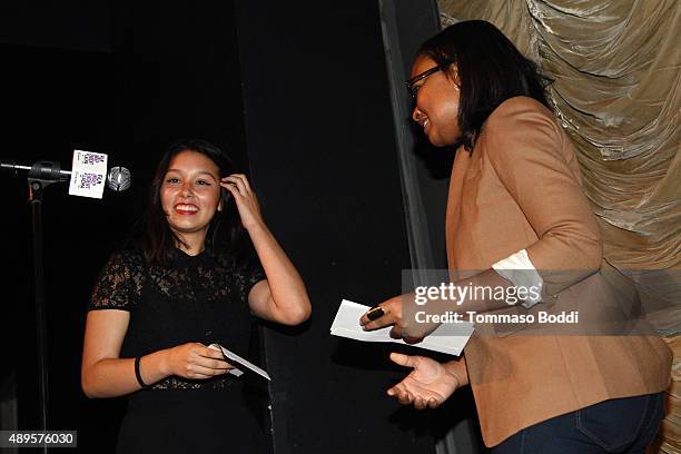 Alvie Johnson honors filmmaker Leslie Torres with a scholarship during the Film Independent at LACMA screening and Q&A of Ghetto Film School Los...