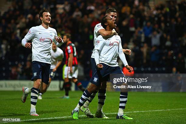 Daniel Johnson of Preston North End celebrates with team mates as he scores their second and equalising goal from the penalty spot during the Capital...