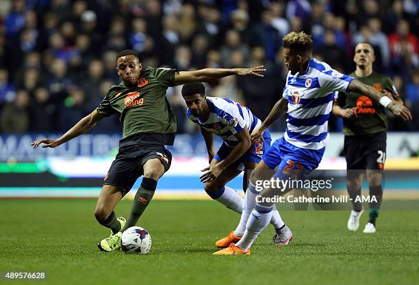 Brendan Galloway of Everton in action with Garath McCleary and Daniel Williams of Reading during the Capital One Cup match between Reading and...