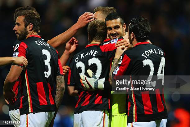 Goalkeeper Adam Federici of Bournemouth celebrates with team mates as he saves the decisive kick in the penalty shoot out during the Capital One Cup...