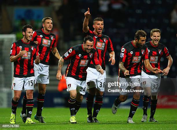 Bournemouth players celebrate victory in the penalty shoot out during the Capital One Cup third round match between Preston North End and AFC...