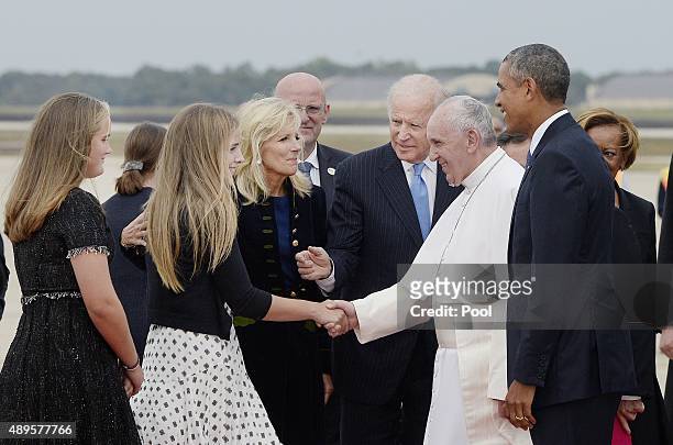 Pope Francis is greeted by U.S. President Barack Obama,Vice President Joe Biden, Jill Biden and invited guests after the pontiff's arrival from Cuba...
